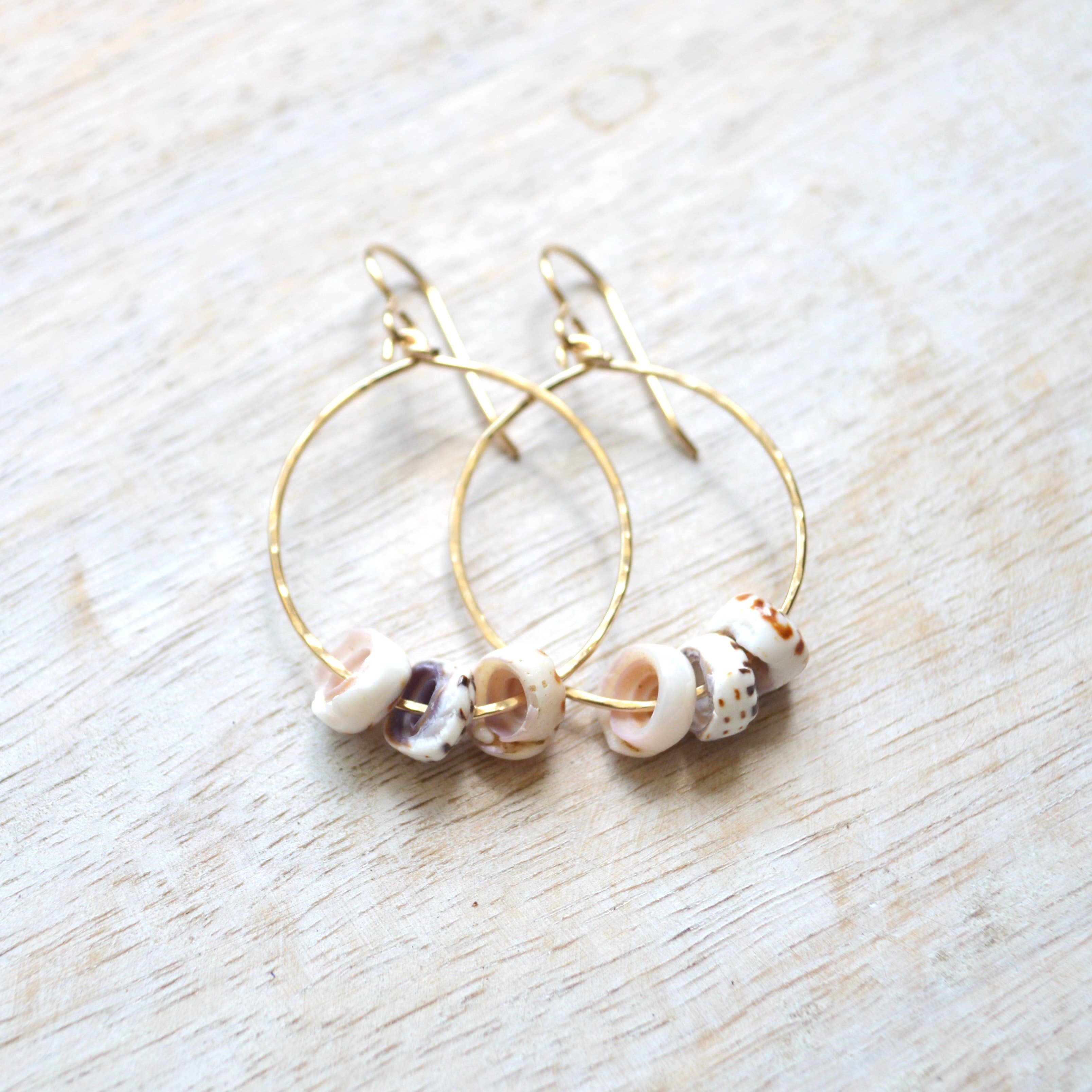 triple puka shell hoop earrings gold