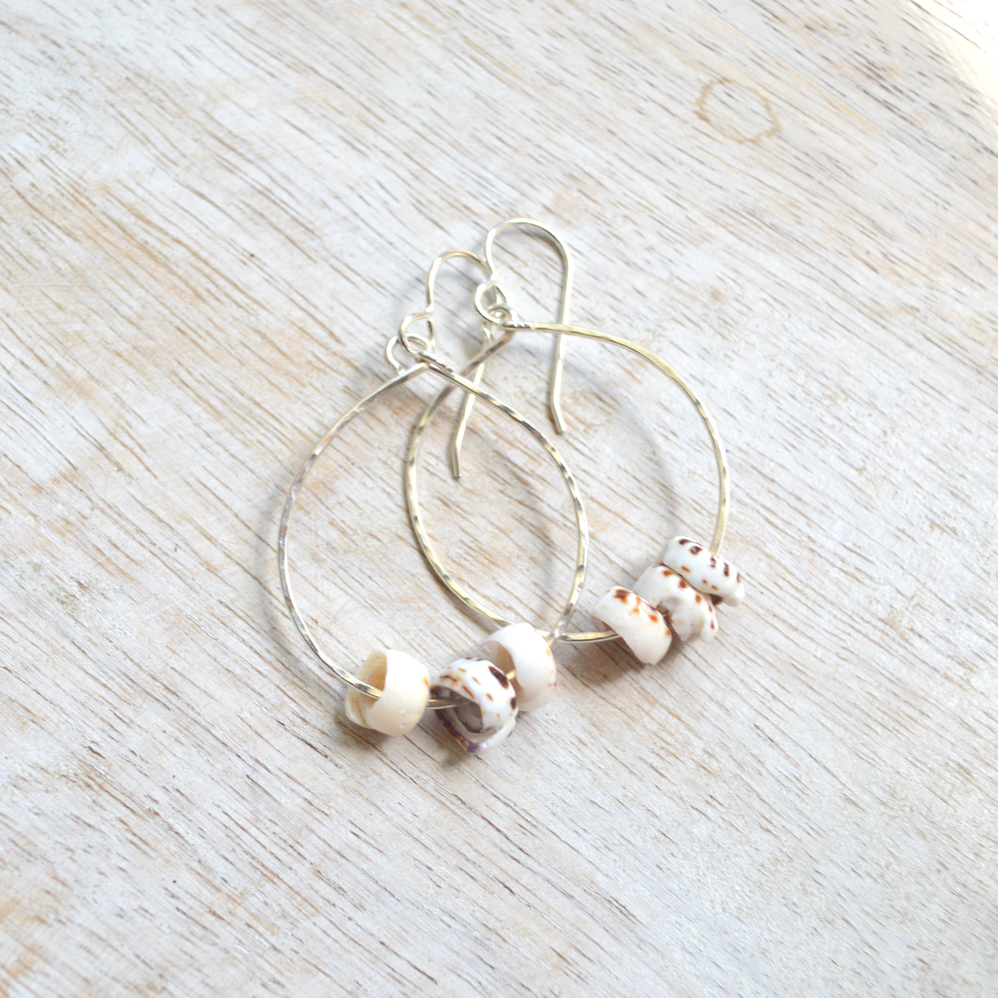 Triple puka shell hoop earrings